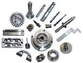 Assorted collection of metal machine parts, including gears, shafts, bolts, and brackets.