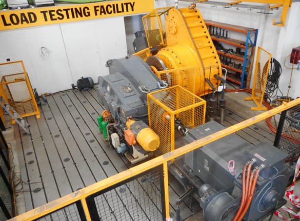 Industrial load testing facility equipped with Siemens Drives, including large AC and DC motors and Siemens SINAMICS components. The setup is designed for rigorous motion control applications.